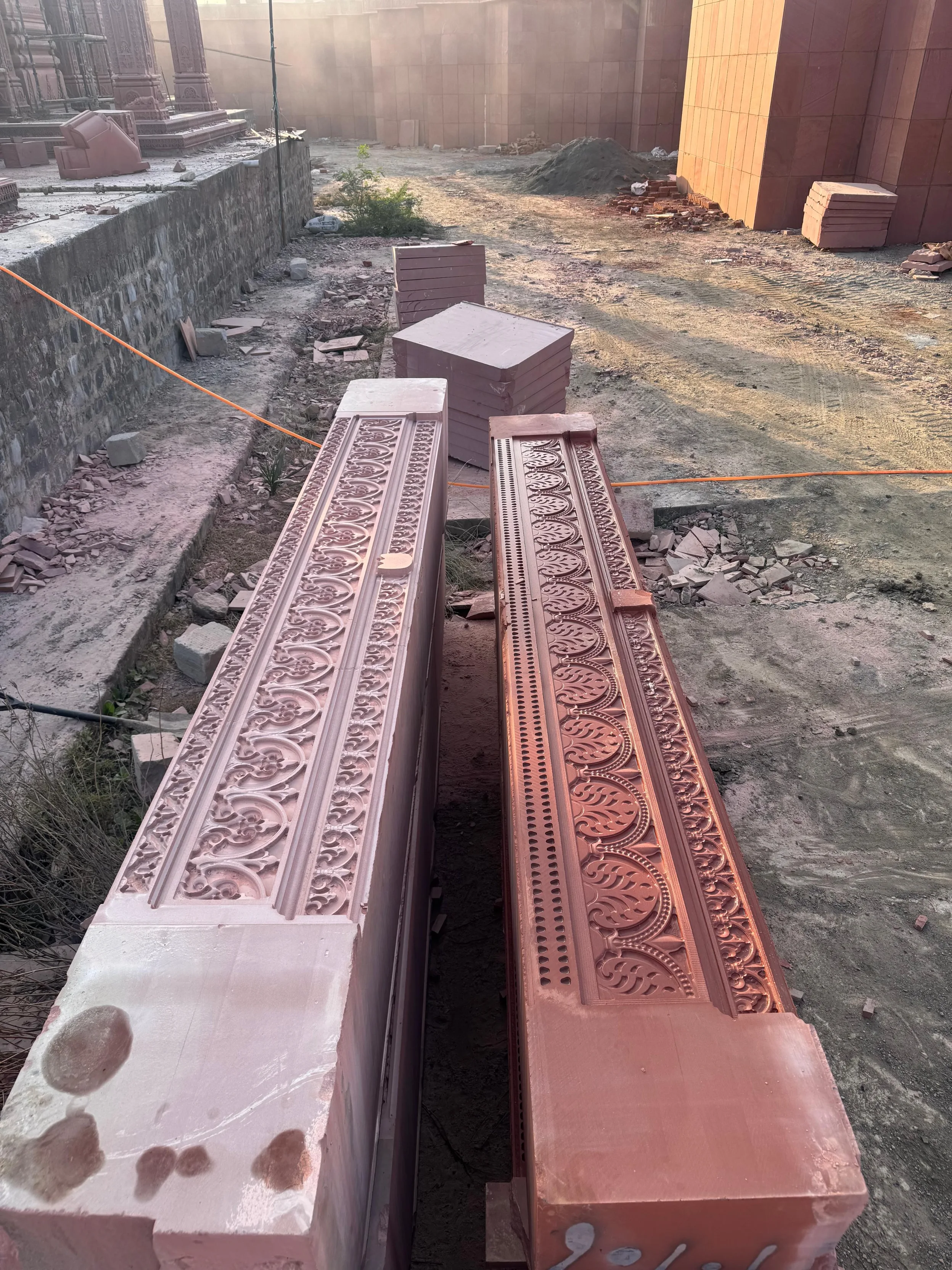 Pair of CNC-carved red sandstone moulding beams