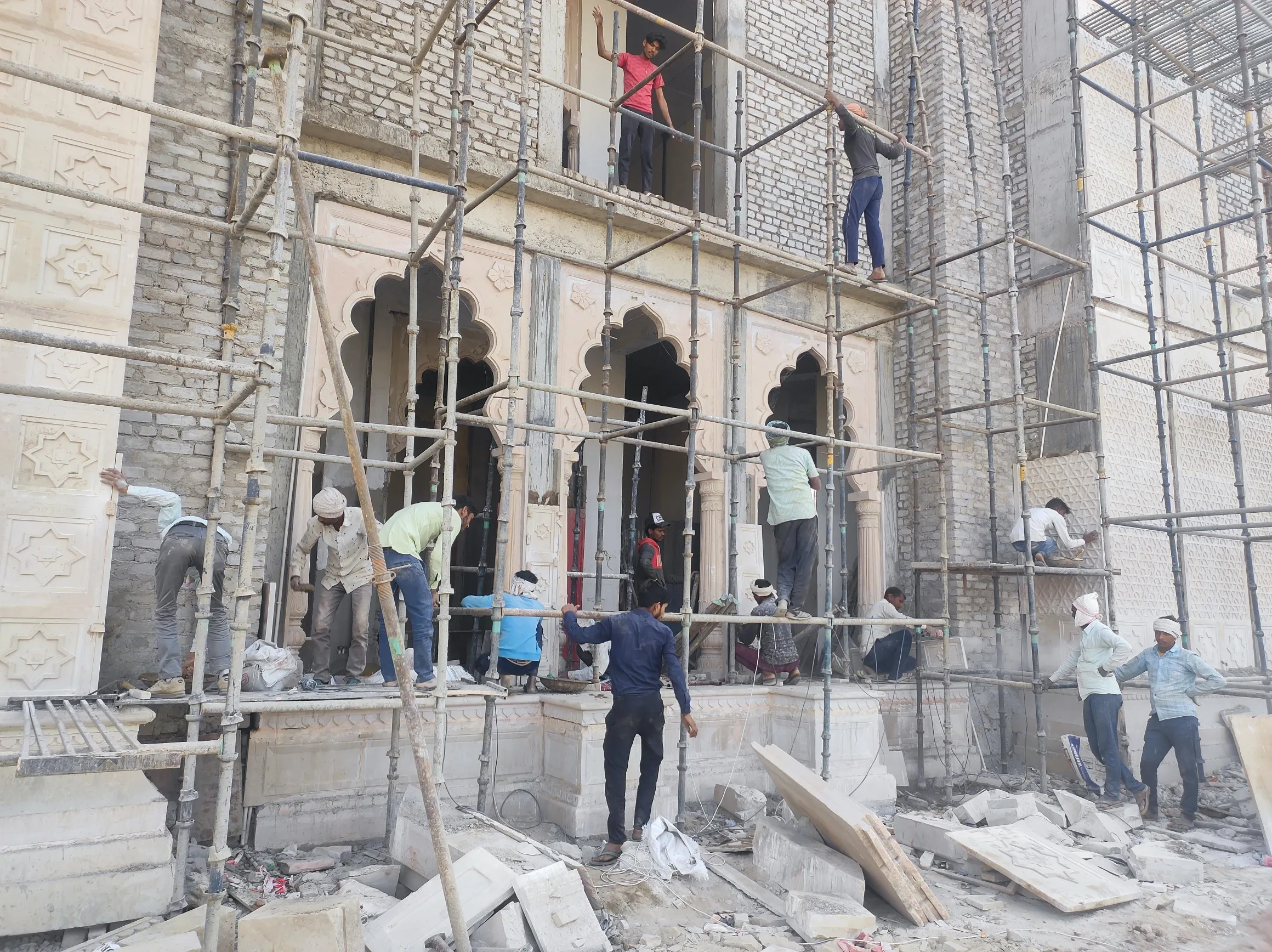 Stone facade installation on site