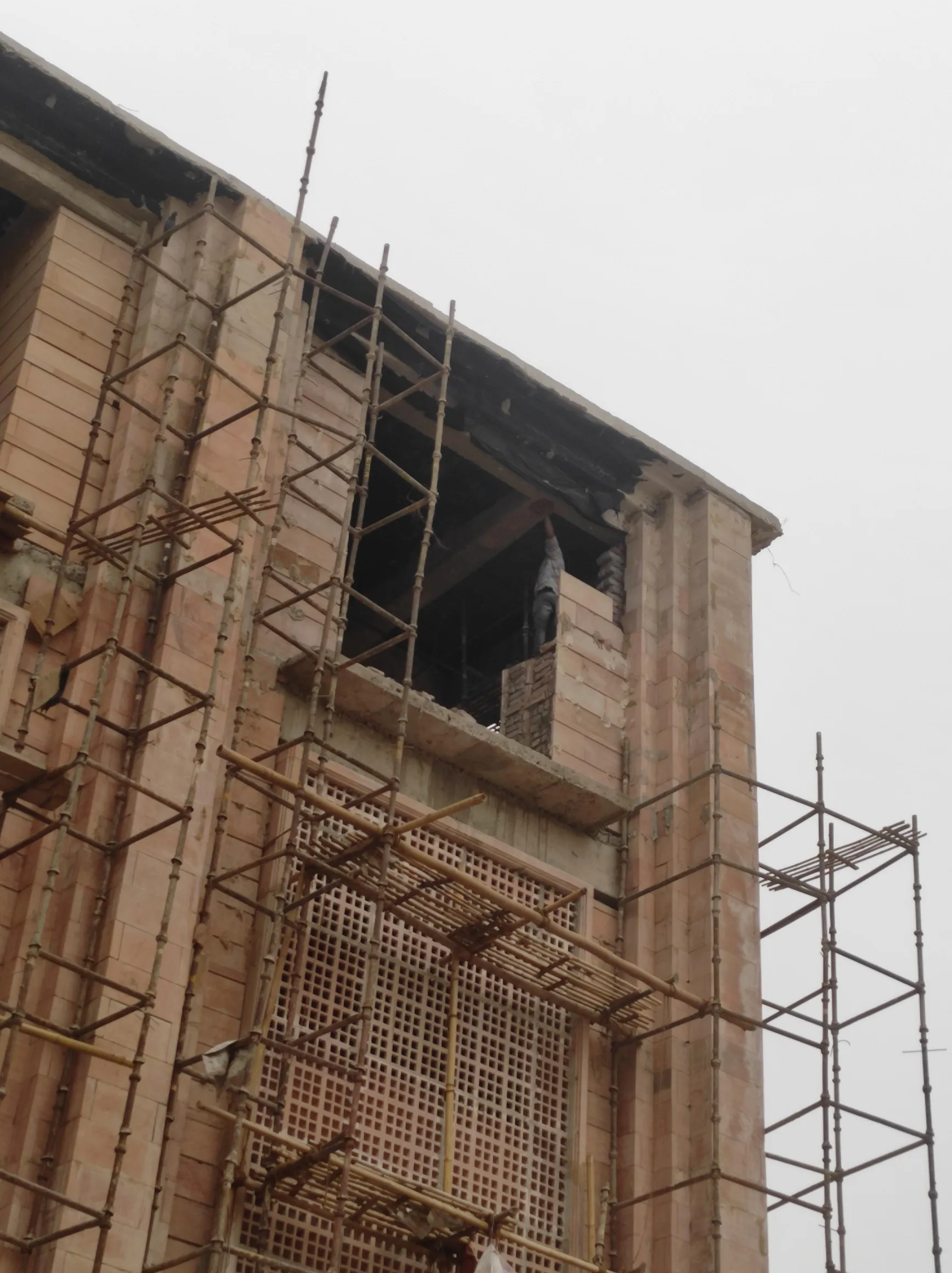 Sandstone building facade under construction