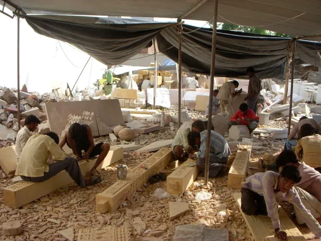 Stone carvers at work in the workshop