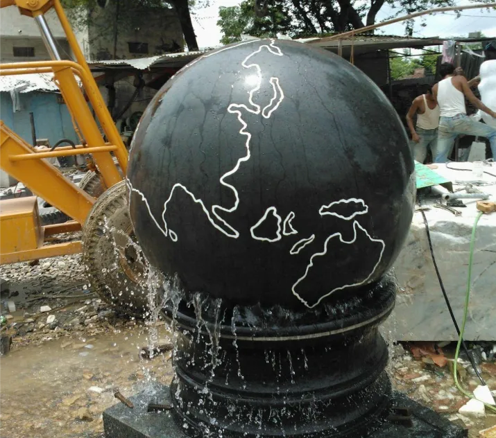 Black granite globe fountain