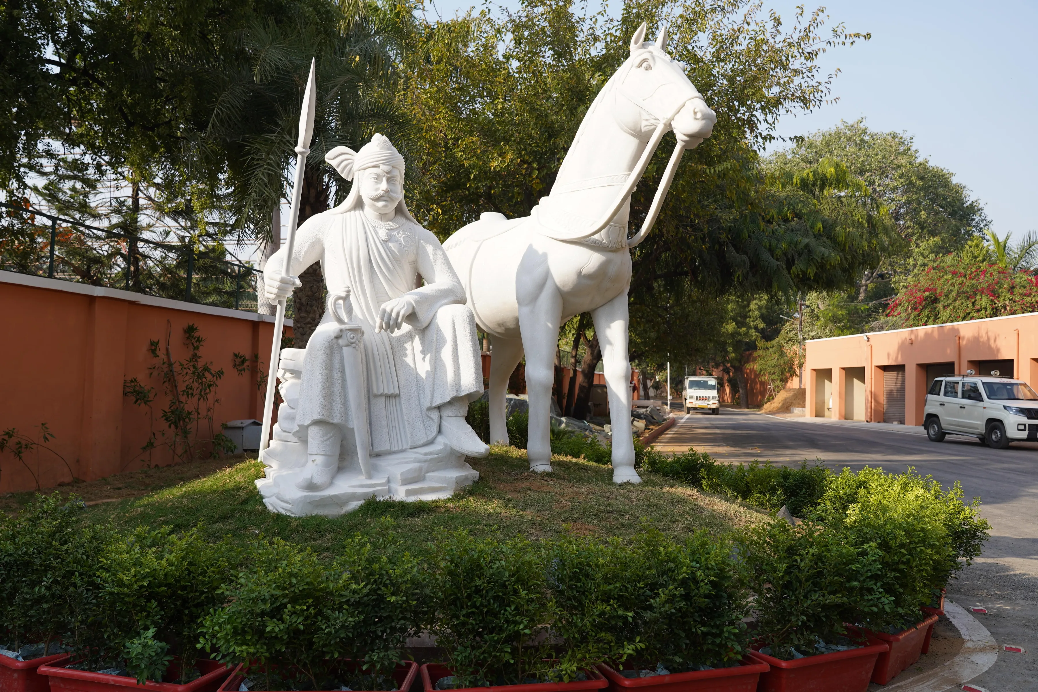 Hand-carved marble statue of a warrior with his horse