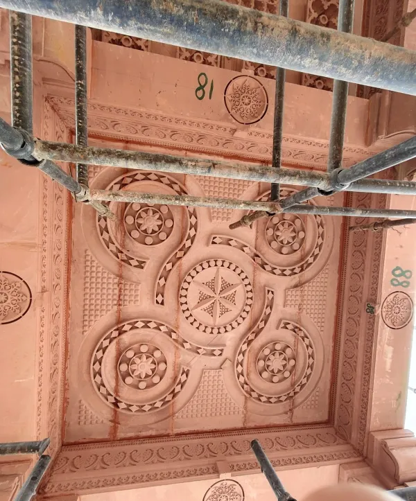 Hand-carved red sandstone ceiling panel