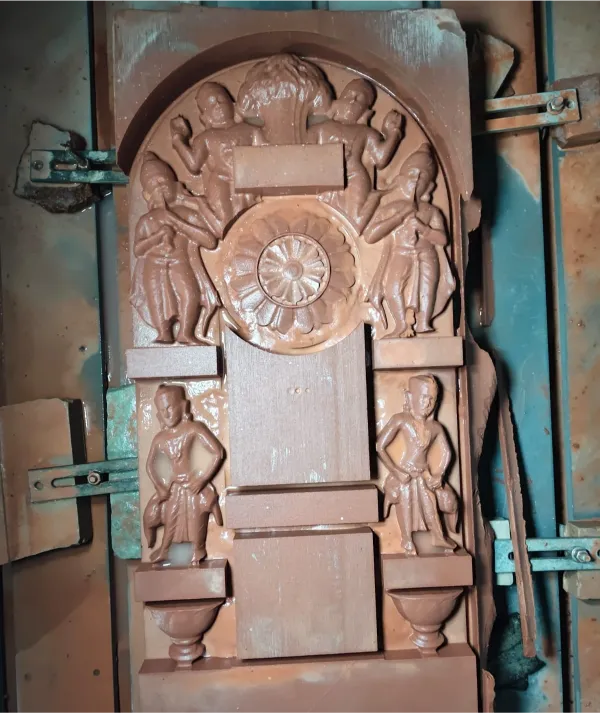 Sandstone panel hand-carved with figures