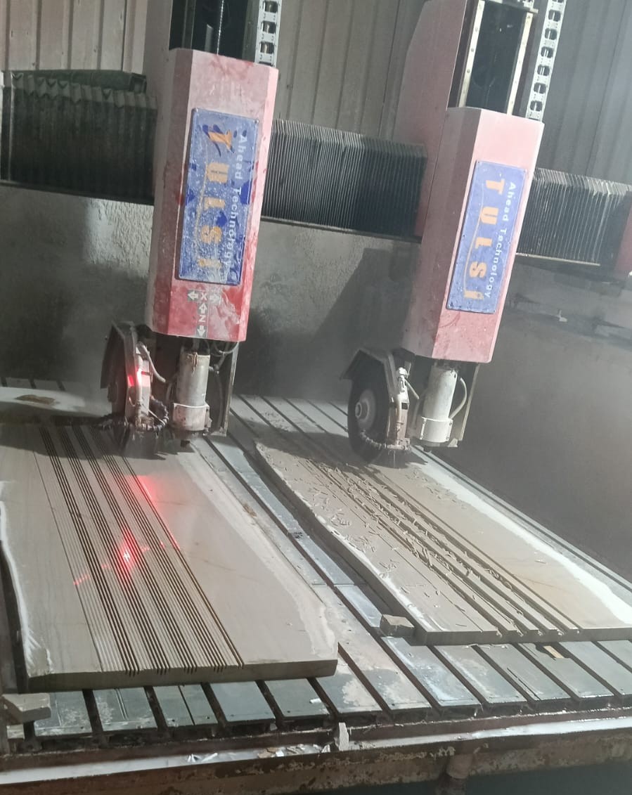 Twin-head CNC machine carving marble panels