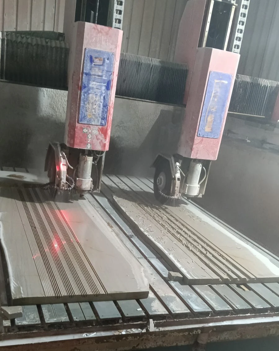Twin-head CNC machine carving marble panels