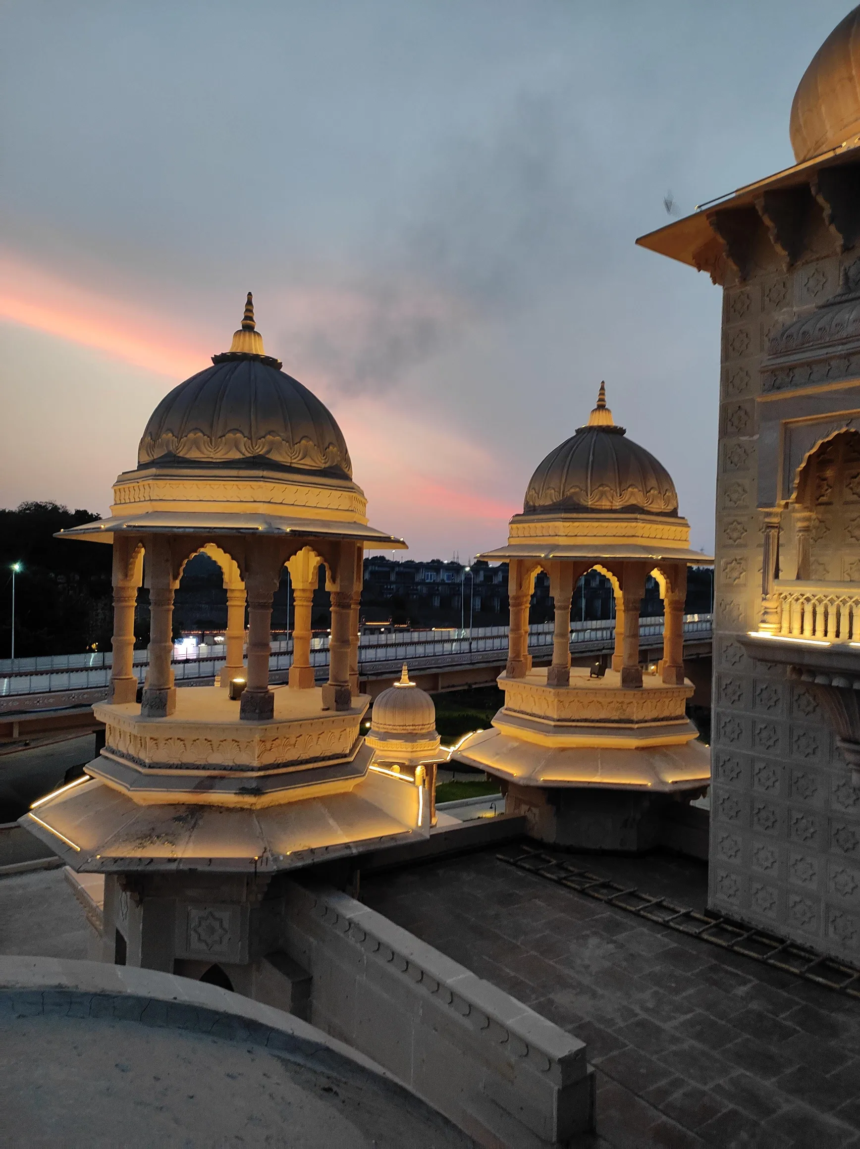 Carved stone chhatris at dusk