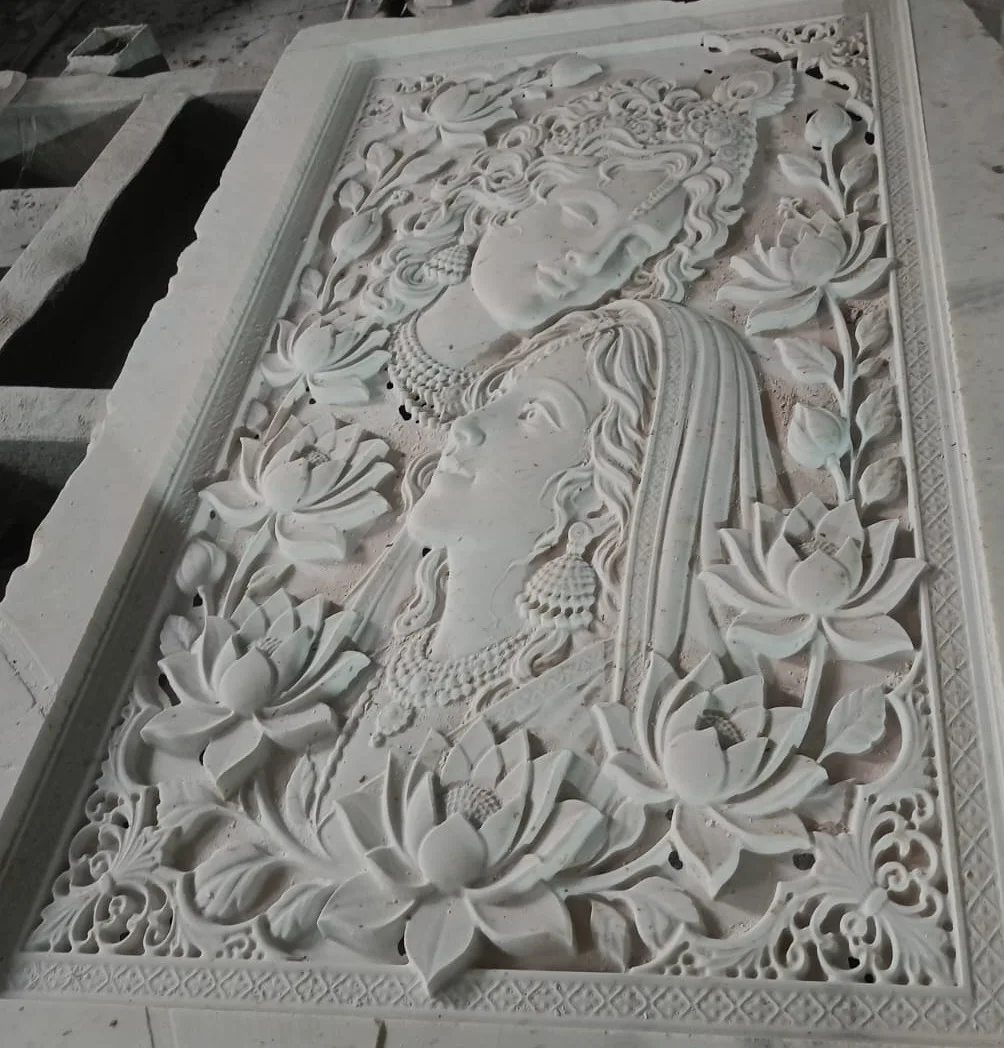 Sandstone relief panel carved with figures