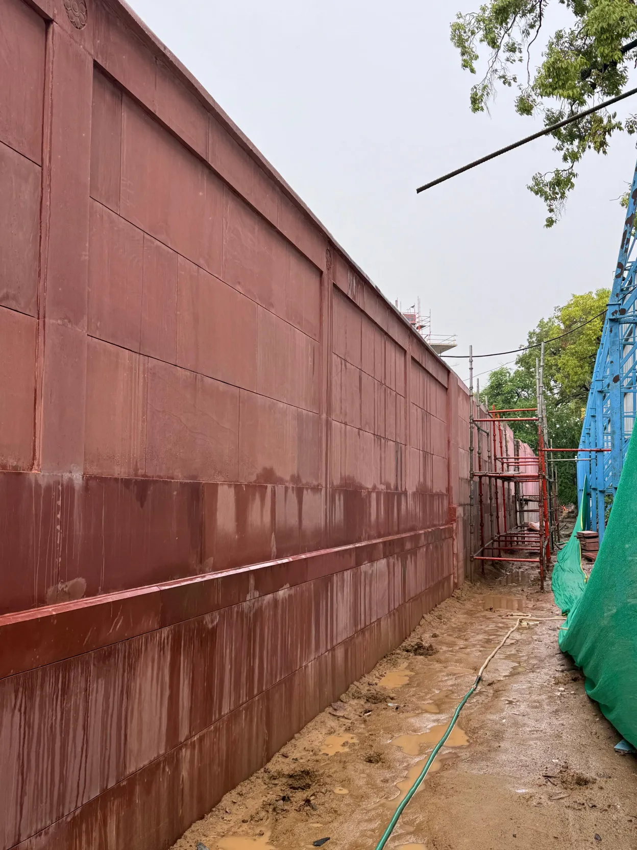 Red sandstone cladding on an exterior wall