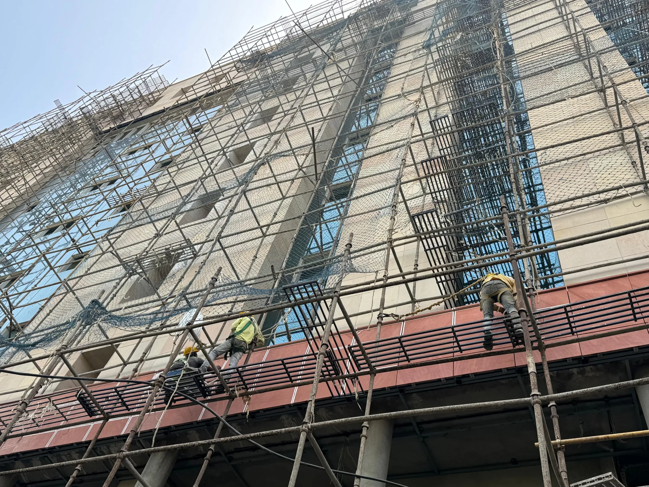 Façade stone cladding on scaffolding – CBSE Headquarters, Dwarka, Delhi