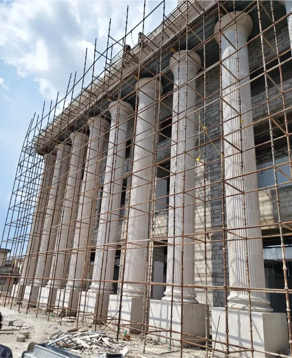 Roman stone column colonnade on scaffolding – IPD Tower (SMS Hospital), Jaipur