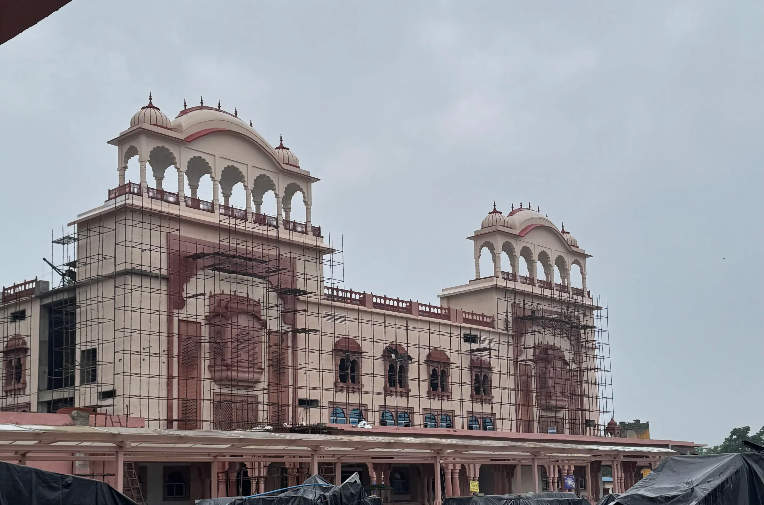 Pink sandstone façade with domed pavilions – Jaipur Junction Redevelopment, Jaipur