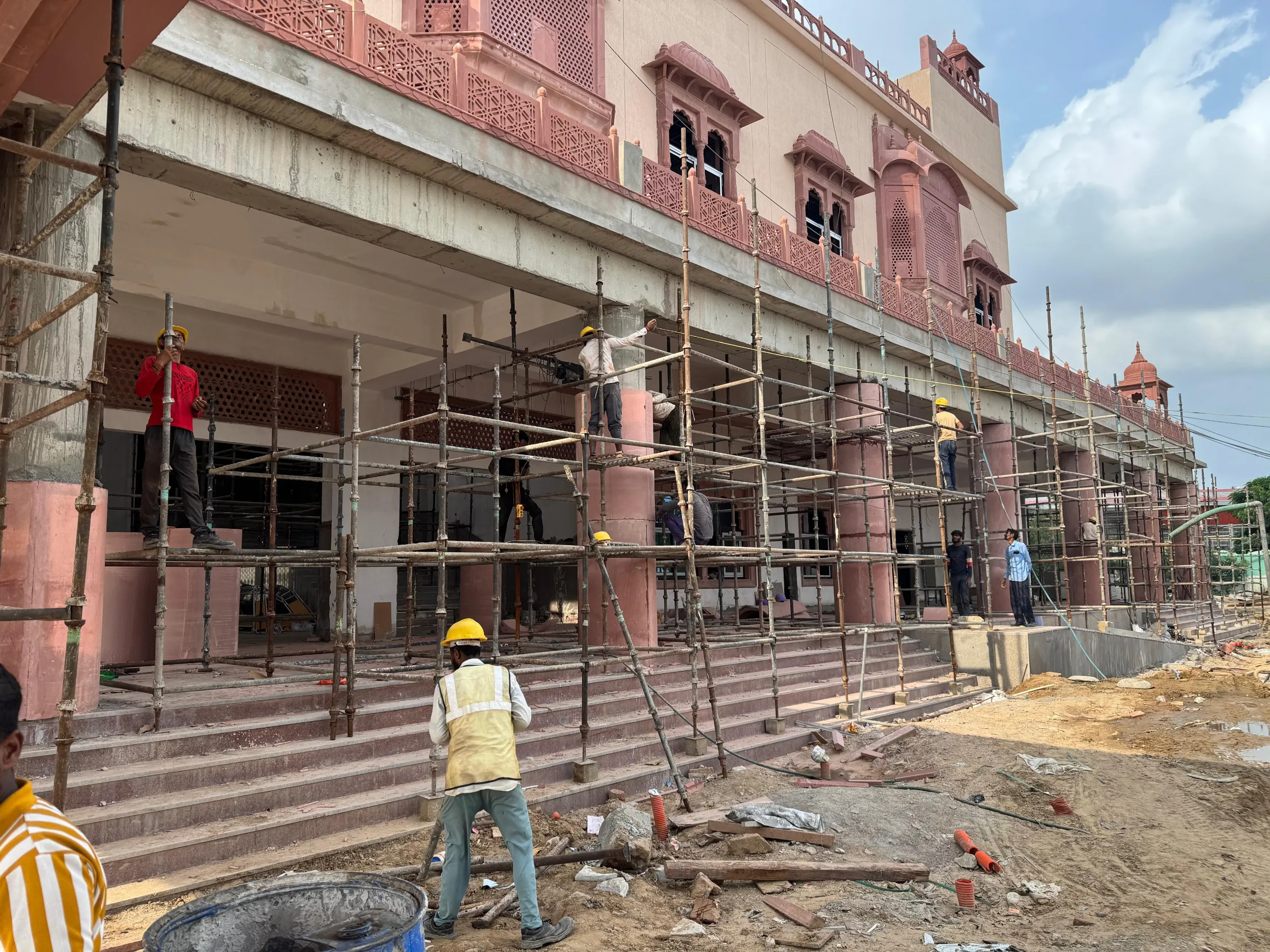 Arched sandstone arcade with scaffolding – Jaipur Junction Redevelopment, Jaipur