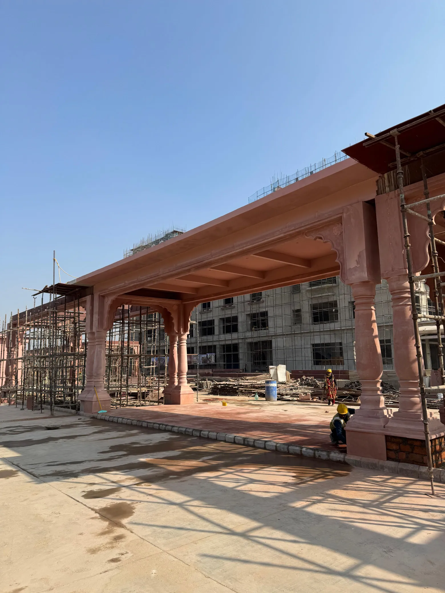 Red sandstone pavilion with carved pillars – Jaipur Junction Redevelopment, Jaipur