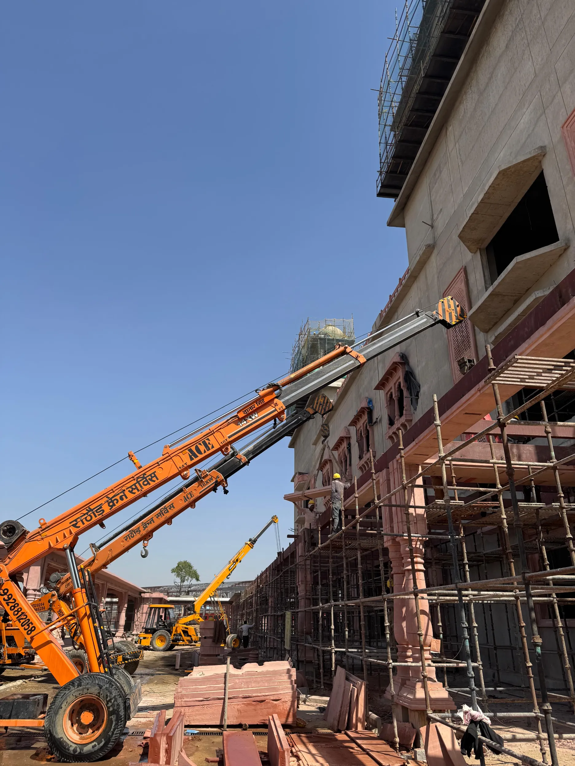 Cranes lifting stone onto the station façade – Jaipur Junction Redevelopment, Jaipur