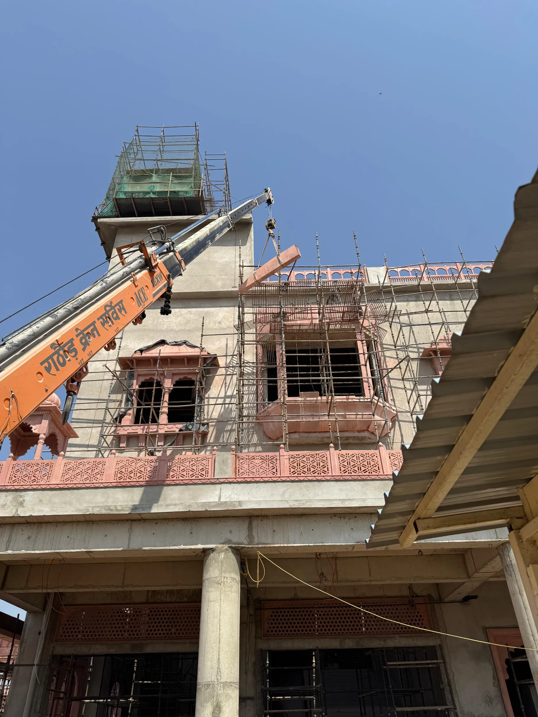 Façade window surrounds being fixed with a crane – Jaipur Junction Redevelopment, Jaipur