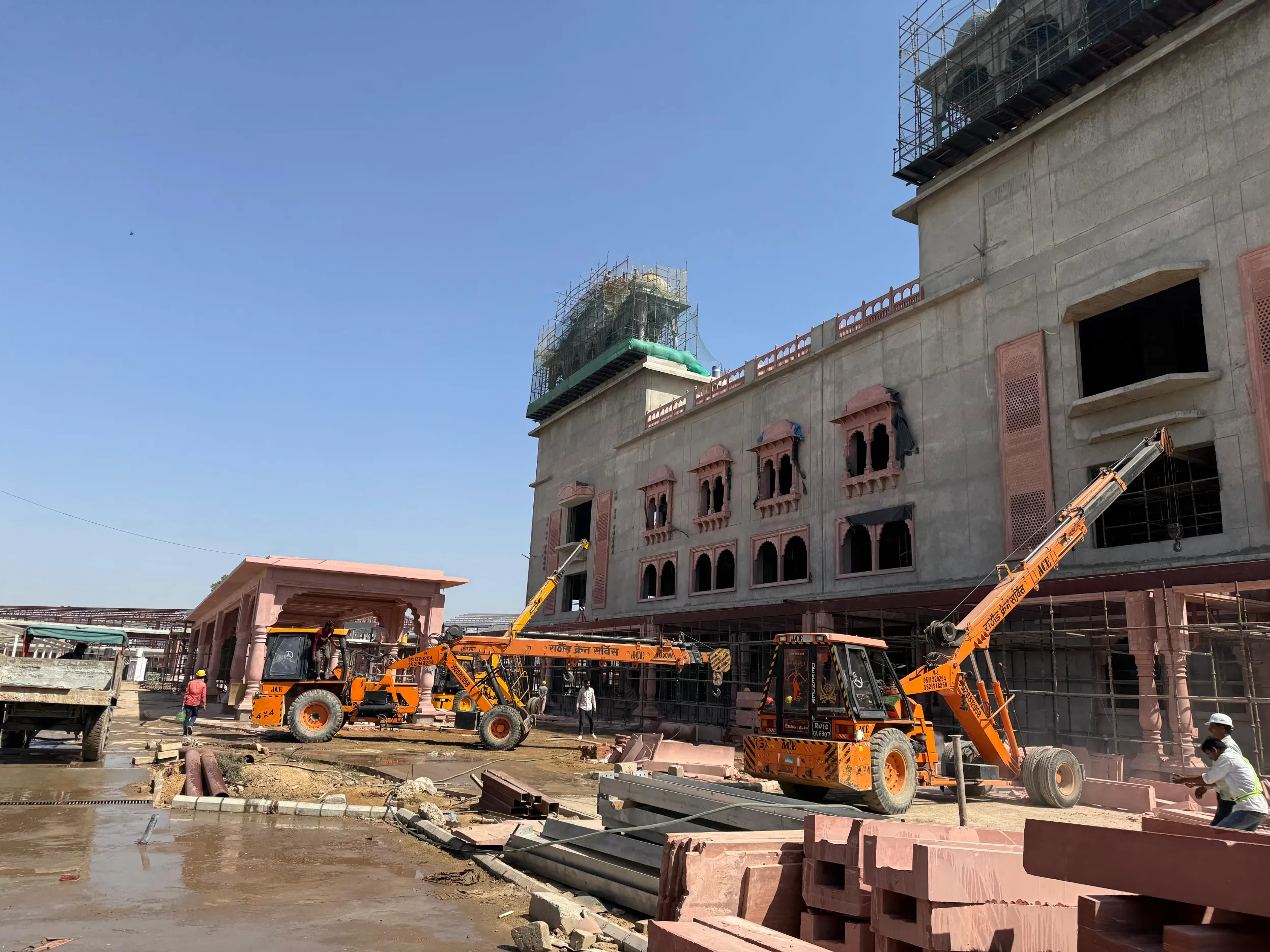 Cranes and stone stock on the station site – Jaipur Junction Redevelopment, Jaipur