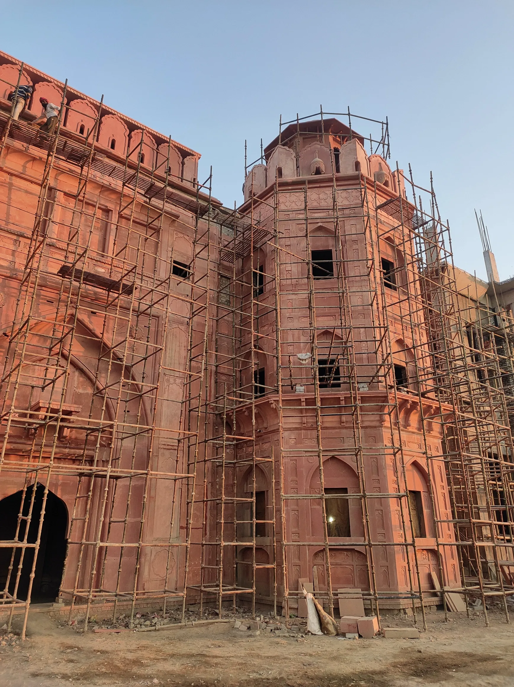 Red sandstone fort tower on scaffolding – Red Fort, Kota