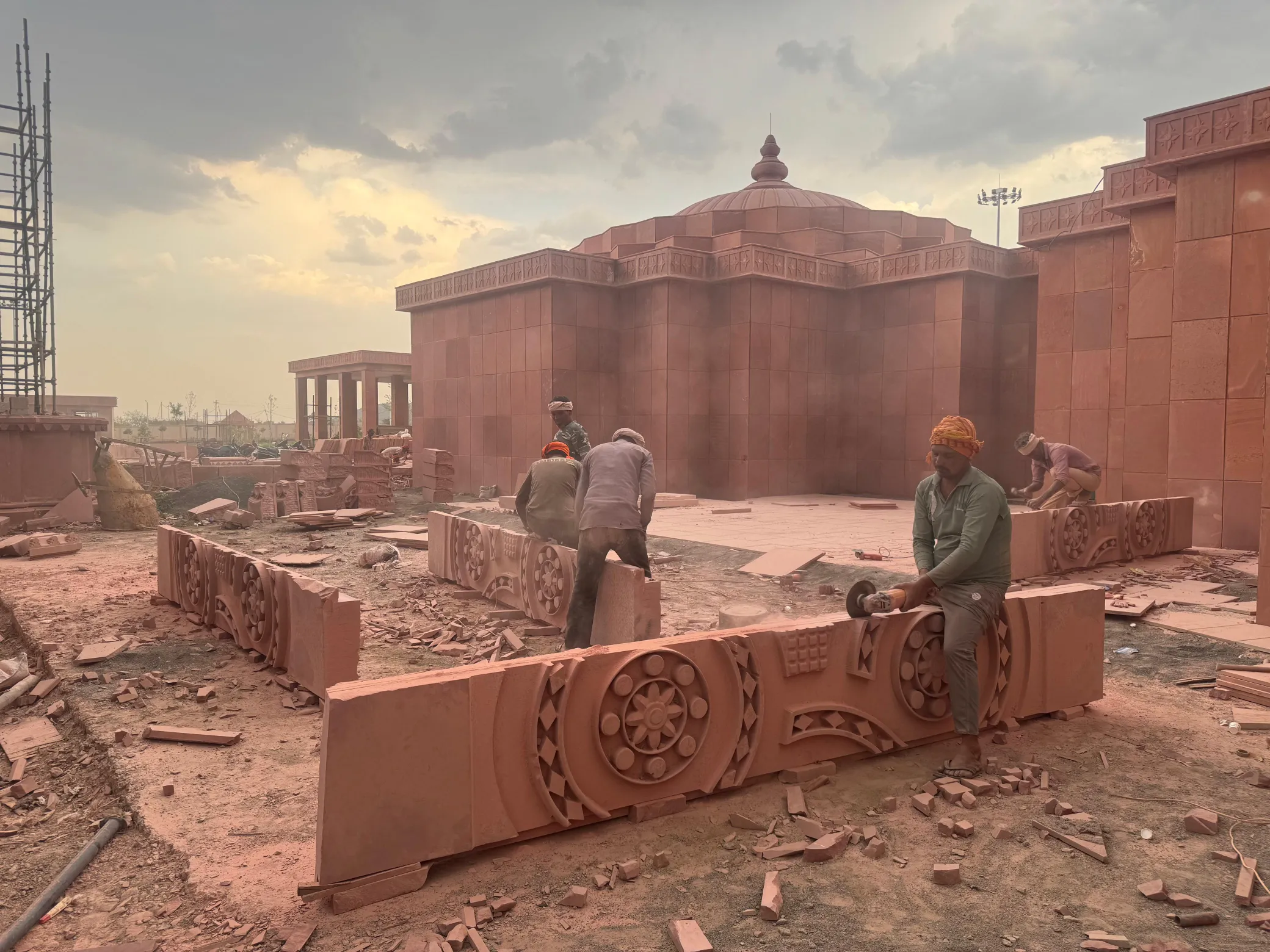 Carved sandstone plinth blocks being set – Sant Ravidas Temple, Sagar