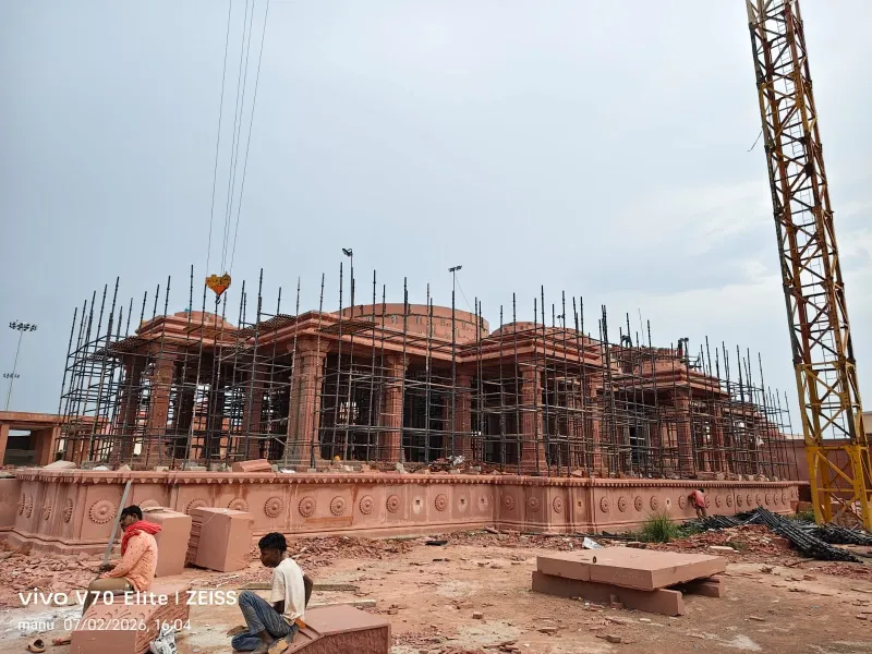 Red sandstone temple pillars and beams rising – Sant Ravidas Temple, Sagar