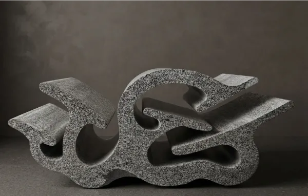 Flowing abstract granite sculpture, a bespoke custom stone project by Umang Arts