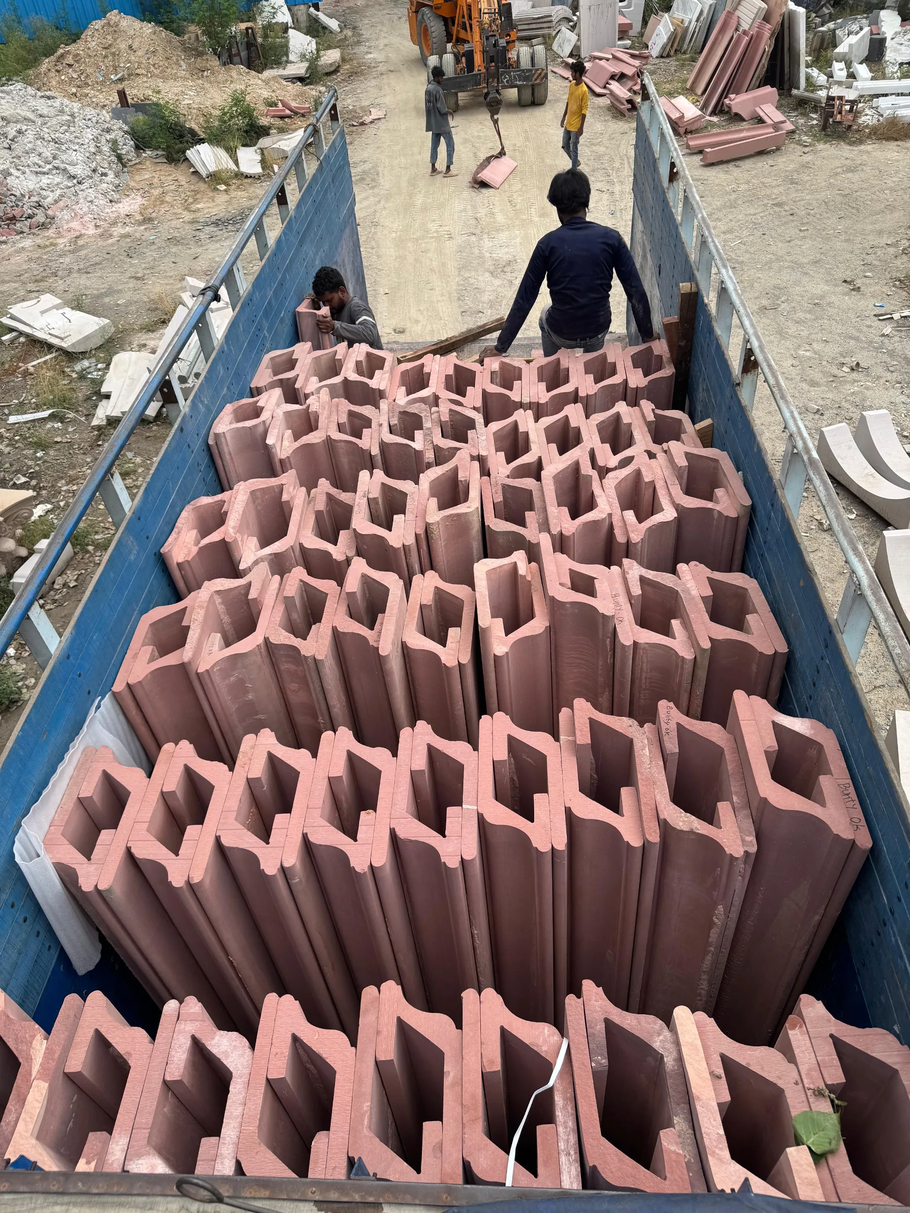 Curved architectural granite components loaded for export