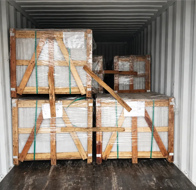 Crated natural stone being loaded onto a truck for dispatch